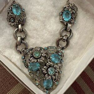 Vintage silvertone flower necklace with blue and green stones.